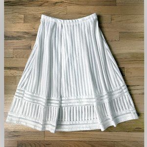 H&M White skirt below-knee. Strong mesh. Size 6.